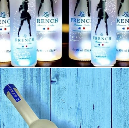 Three La French Vodka bottles
